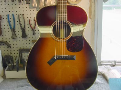 Mini-Harp guitar body with dog-legged pyramid bridge